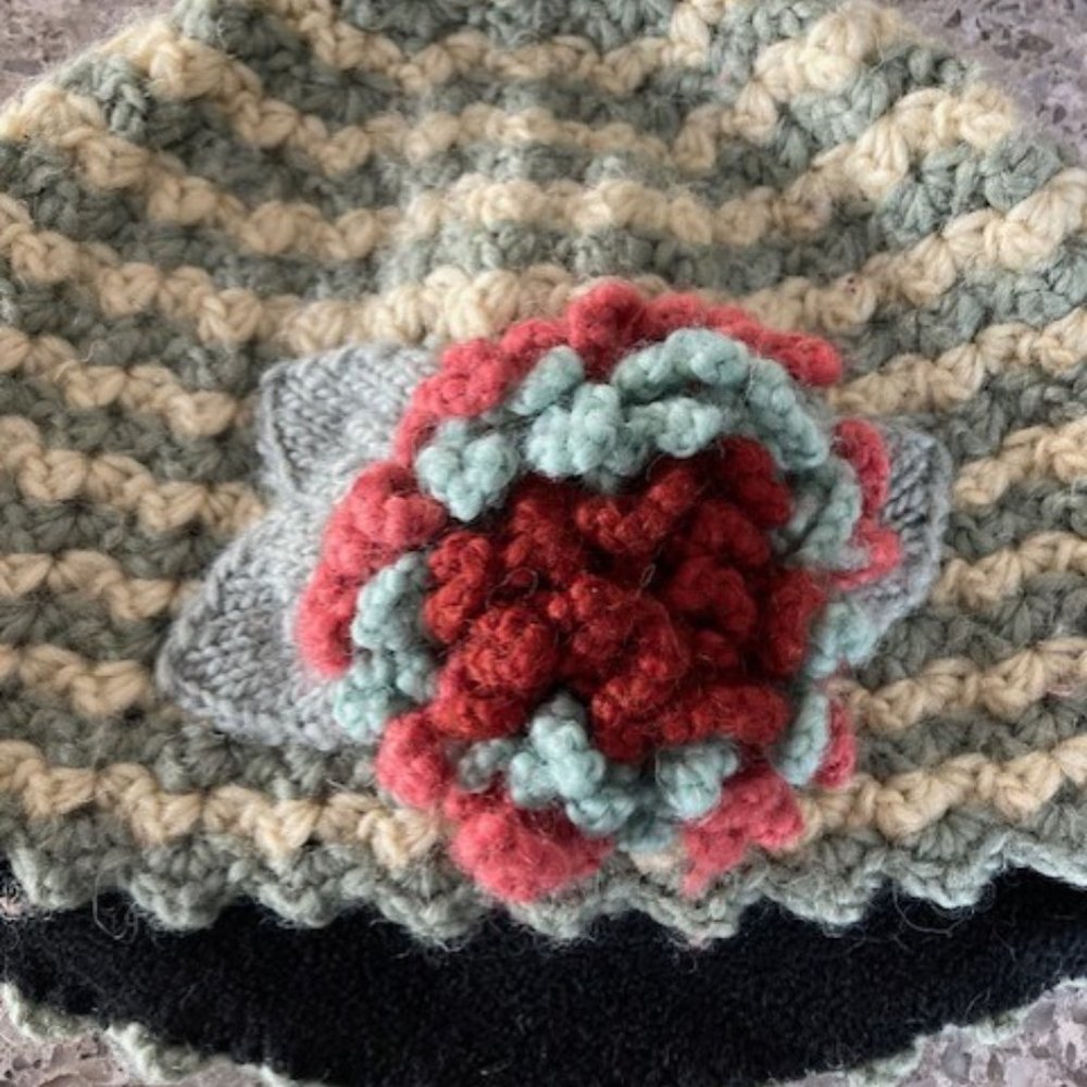 Handcrafted Striped Knit Beanie with Floral Accent